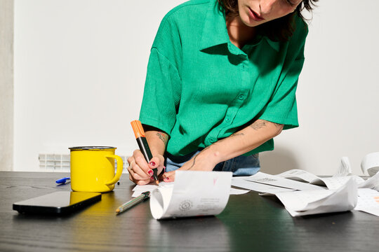 Woman writing on papers