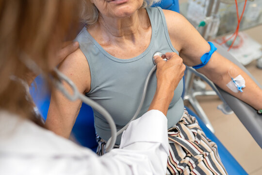 Doctor examining senior patient during medical checkup