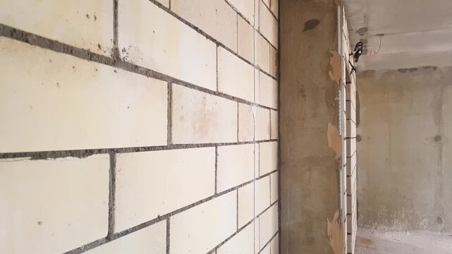 Foam block wall. Block construction, gas silicate block partition, industrial construction of buildings and walls.