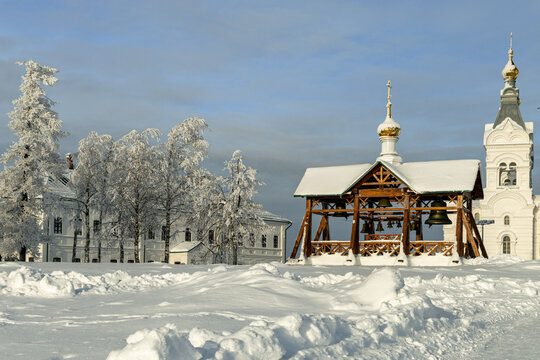 Snow-Covered Bell Pavilion and Frosted Trees in Winter Sun