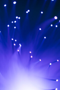 Bright Lights Create Patterns in Dark Space During a Performance