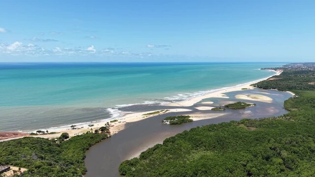 Vista a&eacute;rea de Barra de Gramame, Para&iacute;ba, com encontro do rio e o mar (Aerial view of Barra de Gramame, Para&iacute;ba, Brazil, where the river meets the ocean)