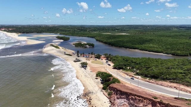 Vista a&eacute;rea de Barra de Gramame, Para&iacute;ba, com encontro do rio e o mar (Aerial view of Barra de Gramame, Para&iacute;ba, Brazil, where the river meets the ocean)