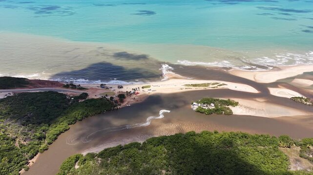 Vista a&eacute;rea de Barra de Gramame, Para&iacute;ba, com encontro do rio e o mar (Aerial view of Barra de Gramame, Para&iacute;ba, Brazil, where the river meets the ocean)