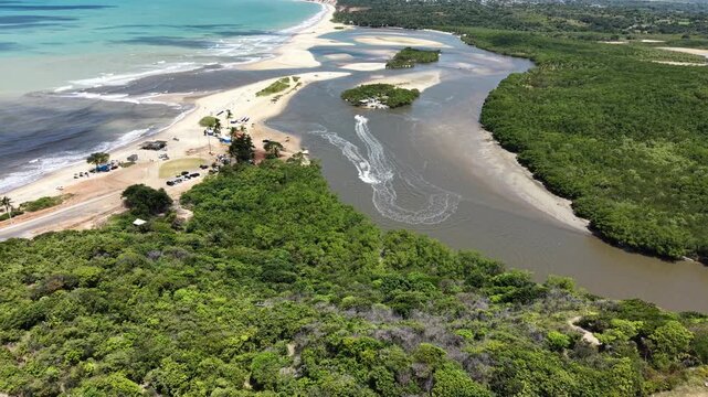 Vista a&eacute;rea de Barra de Gramame, Para&iacute;ba, com encontro do rio e o mar (Aerial view of Barra de Gramame, Para&iacute;ba, Brazil, where the river meets the ocean)
