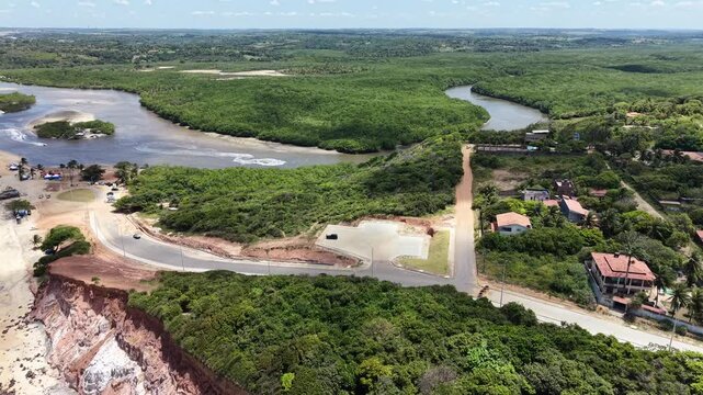 Vista a&eacute;rea de Barra de Gramame, Para&iacute;ba, com encontro do rio e o mar (Aerial view of Barra de Gramame, Para&iacute;ba, Brazil, where the river meets the ocean)