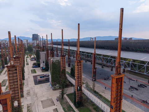 Aerial view of the industrial structures and steel pillars of Parco Dora in Turin, Piedmont, Italy.