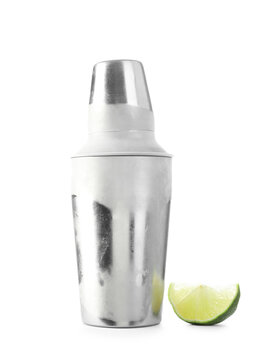 Shaker and lime slice isolated on white