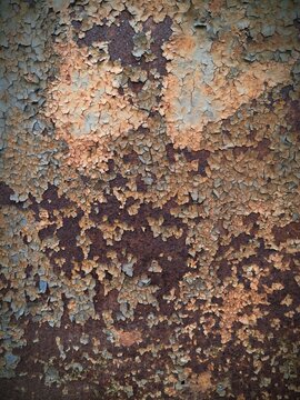 Rusted metal with peeling paint, great for industrial or abandoned places scenes