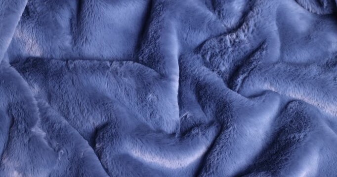 Beautiful, abstract, plush, blue fur fabric with a pleasant drape
