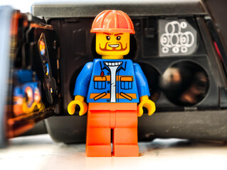 Fototapeta premium Russia, St. Petersburg, August 8, 2020. Close-up of a Lego man, camera, ideal for creative projects and illustrations.