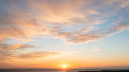 Fototapeta premium Beautiful Sunset Sky with Soft Clouds Over Horizon