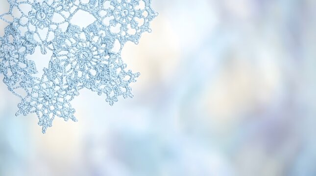 This captivating abstract image evokes the serene beauty of winter featuring a delicate snowflake pattern against a soft pastel colored blurred background creating