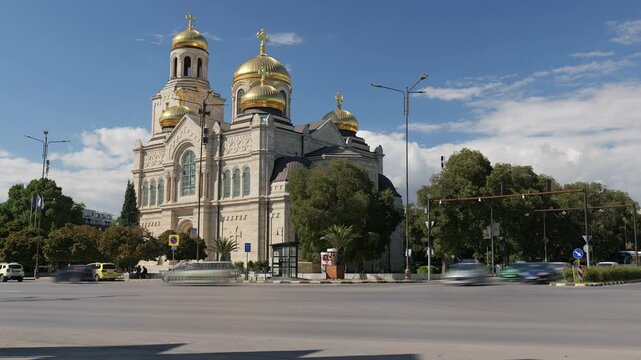 Dormition of the theotokos cathedral in varna and bustling city traffic