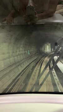 Kuala Lumpur, Malaysia - Public Transportation System, Elevated Trains and Monorail, Driverless High-Speed Metro Train, Subway Tunnel, Train Arriving on a Dedicated Rail Line