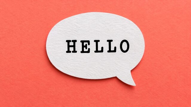 White Paper Speech Bubble With Black Hello Text Centered On Vibrant Textured Red Background, Minimalistic Communication Concept For Greeting