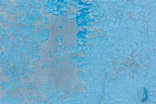 cracked paint blue texture background space for text or design purposes