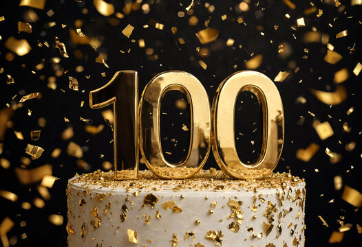 Celebration cake topper displaying one hundred anniversary number with gold confetti