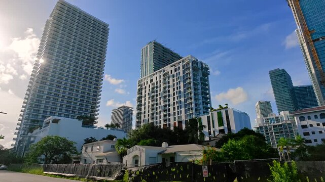 Panning video Edgewater Miami new skyscrapers and old homes soon to be demolished