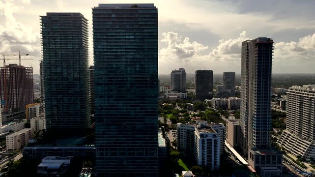 Slow aerial drone video Miami Edgewater contrast backlit sunset city view
