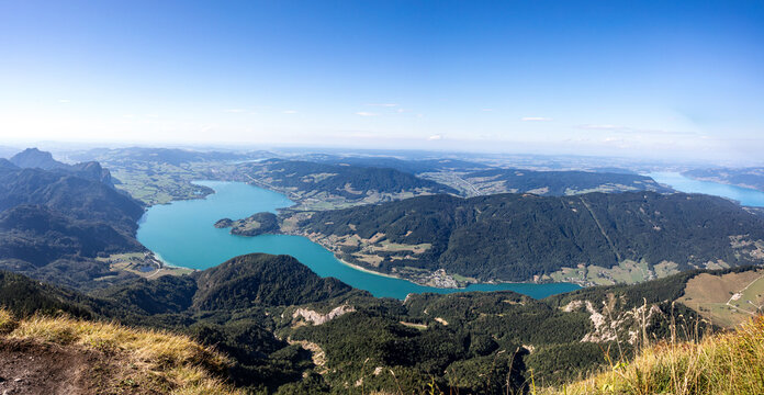 Panoramic mountain landscape overlooking Wolfgangsee lake and surrounding Austrian Alps in the Salzkammergut region