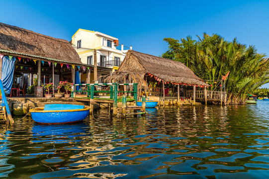 A view along the waterways of the Bay Mau Coconut Forest in Cam Thanh village near Hoi An, Vietnam on a bright sunny day