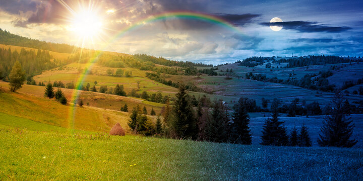 rural fields on autumn equinox. day meet night. sun and moon over trees on the grassy hills at twilight. beautiful countryside scenery of carpathian mountains. clouds on the epic sky