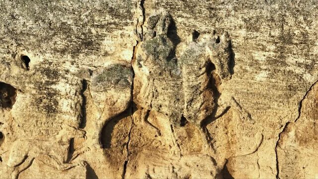 Madara Rider UNESCO world heritage medieval rock relief carved into cliff close up historic landmark in Bulgaria summer hiking travel destination slow motion video