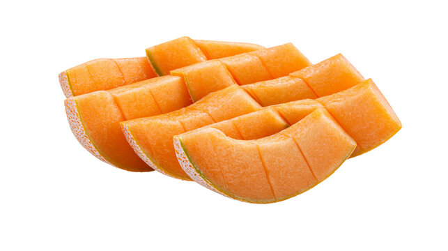Isolated fresh juicy cantaloupe melon slices beautifully arranged on a clean bright surface.