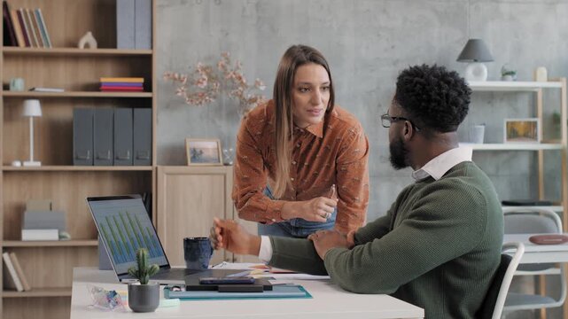 Angry manager scolding employee for poor performance