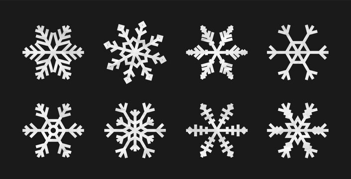 Set of snowflakes cut-out from crumpled paper. Snowflakes made from crumpled white paper texture. Winter and Christmas design elements. Vector.