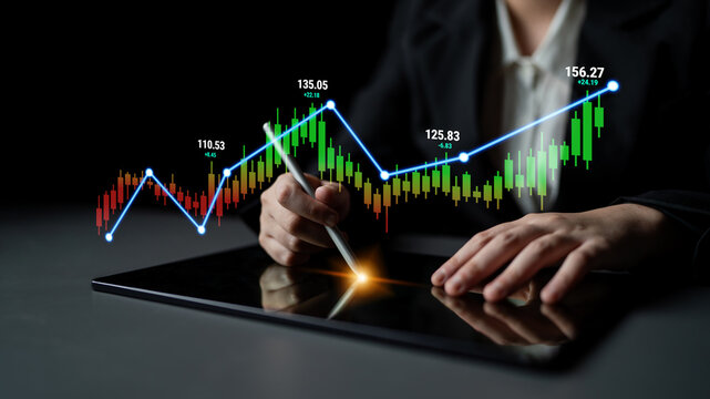 Business Professional Analyzing Stock Market Trends with Digital Tablet Displaying Financial Graph and Data for Investment Strategy Quark.