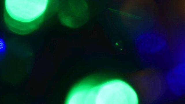 Vivid Green and Deep Blue Abstract Defocused Bokeh Spheres