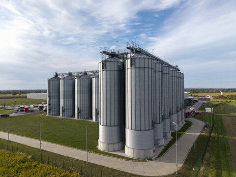 Aerial view of large grain storage silo complex and agricultural processing facility