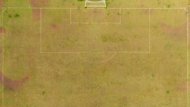 Aerial view of a soccer field with a goalpost on a grass pitch in Klaten, Central Java, Indonesia.