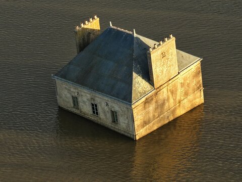 Coueron, France - 29 December 2025: Aerial view of La Maison dans la Loire, a surreal art installation appearing as a half-submerged house in the Loire River, with weathered stone walls.