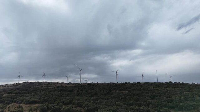 Wind renewable energy. Windmills in the highlands. Production of electric energy.