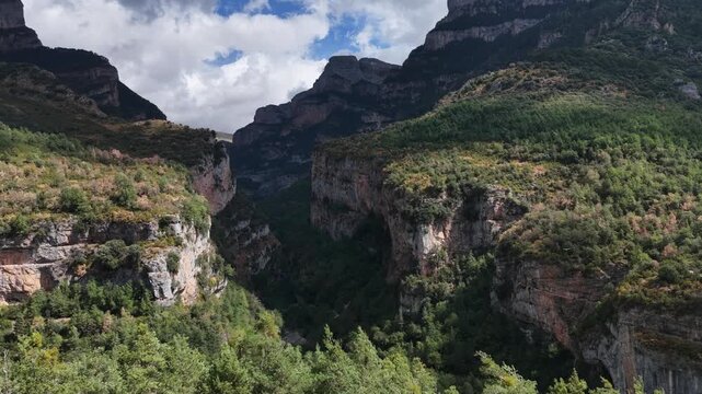 The Anisclo canyon seen from above in autumn, the erosion of the Bellos river in the mountains, in the Pyrenees of Huesca, Spain 