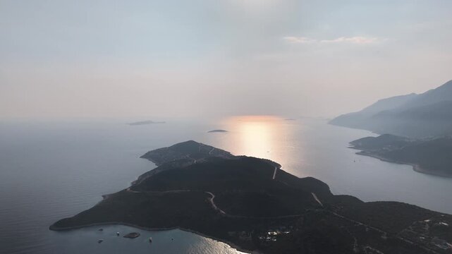 Winding Coastal Road on Kas Peninsula at Dusk with Kastellorizo Island