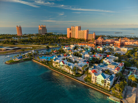 New Providence, The Bahamas - 03 January 2026: Aerial view of Paradise Island featuring the Atlantis resort complex, colorful waterfront buildings, and turquoise Caribbean sea.