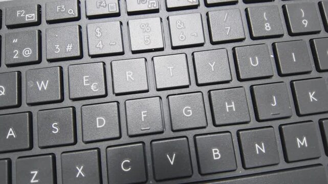 Black computer keyboard with letters and numbers