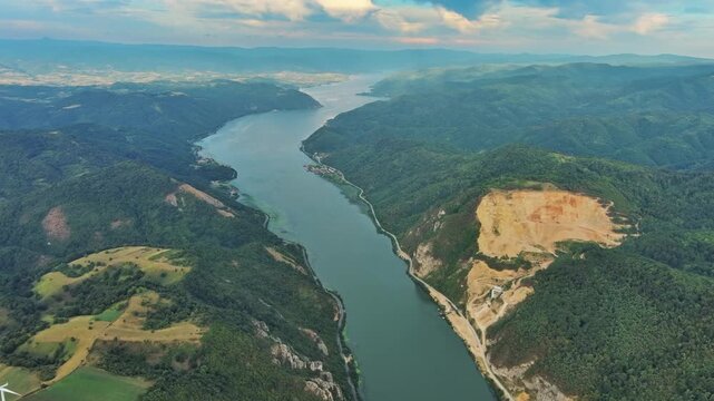 Aerial view on the Danube river and mountains in Djerdap National Park at sunset, Serbia Romania border, 4k