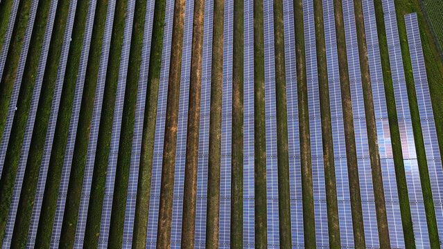 Aerial view of a solar power station showcasing sustainable energy production and a clean environment