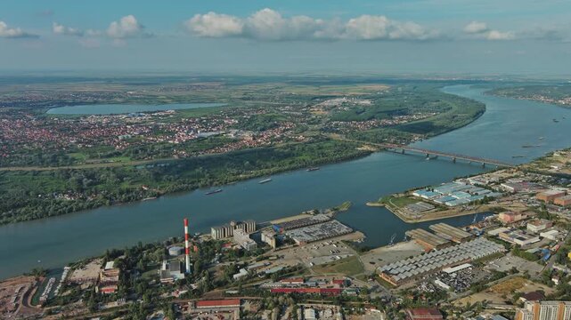 Aerial view of Belgrade with Sava and Danube rivers, historic fortress, urban skyline, bridges, parks, and waterfront landscape Serbia, 4k