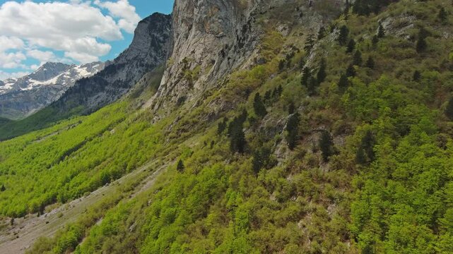 Aerial view of mountains with green forest, Prokletie park, Montenegro and Albania, 4k