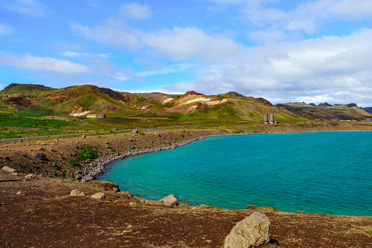 G&iacute;gvatnsvatn or Graenesvatn, crater known as the Green Lake in the Reykjanes Peninsula of Iceland. The lake is surrounded by lava fields, mountains and colorful houses.