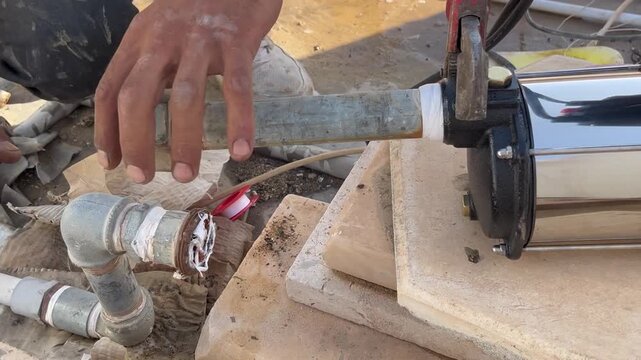  How to Align and Connect Metal Pipes to a Water Pump