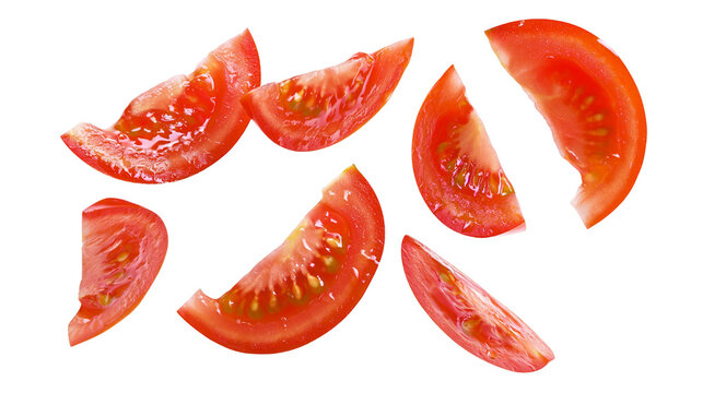 Isolated ripe red tomato wedges falling, fresh juicy organic vegetable slices.