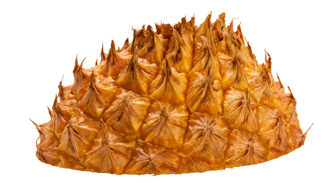 Isolated textured surface of a ripe pineapple peel, rich golden-orange color