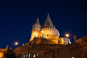 Illuminated turret of Fisherman's Bastion against night sky © WeiChun